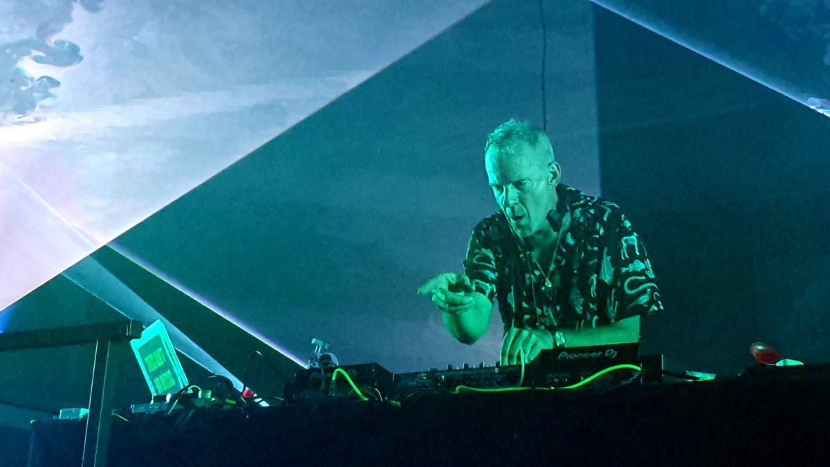 Norman Cook DJing with lasers overhead